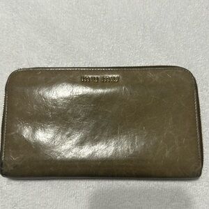 Miu Miu long wallet in distressed leather
